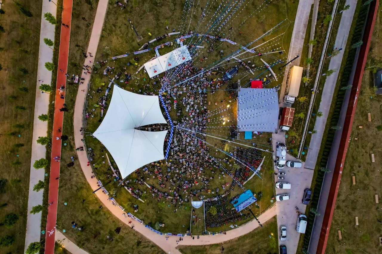 Live music concert crowd with stage lights at Canadian music festival venue