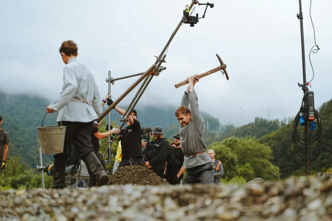 Film production set with camera crew and lighting equipment on location in Canada