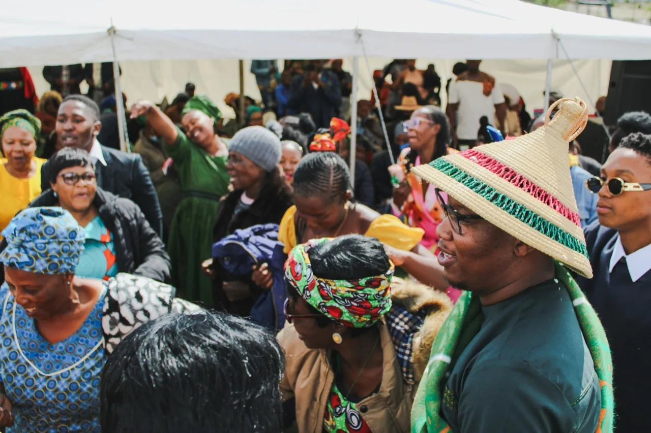 Cultural community festival celebration with diverse attendees at outdoor Canadian event